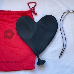 CJ Hendry deflated heart sculpture in black